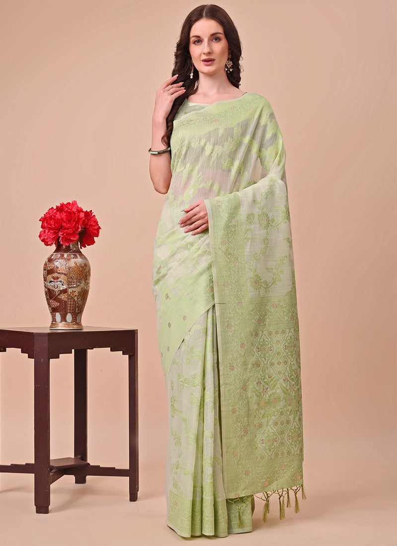 Image of Light Green Cotton Saree with Floral Weaving & Tassel Pallu from Lehera Fashions