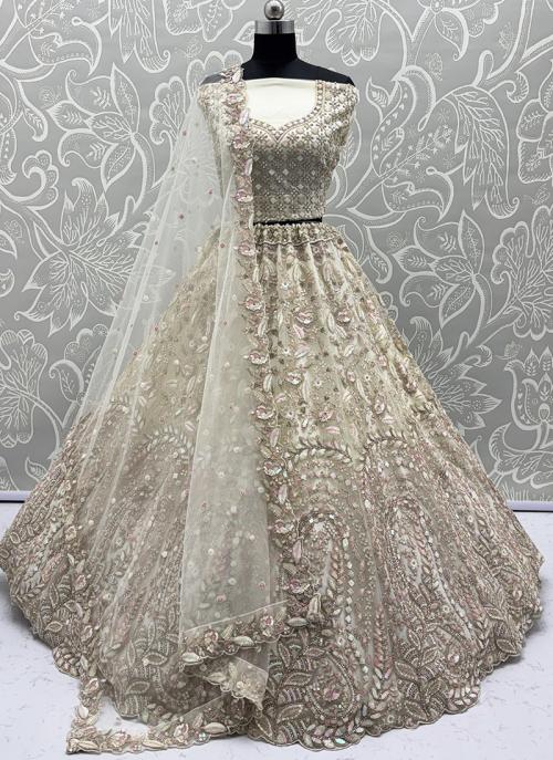 Image of Elegant Off White Heavy Net Thread Embroidered Wedding Lehenga Choli from Lehera Fashions