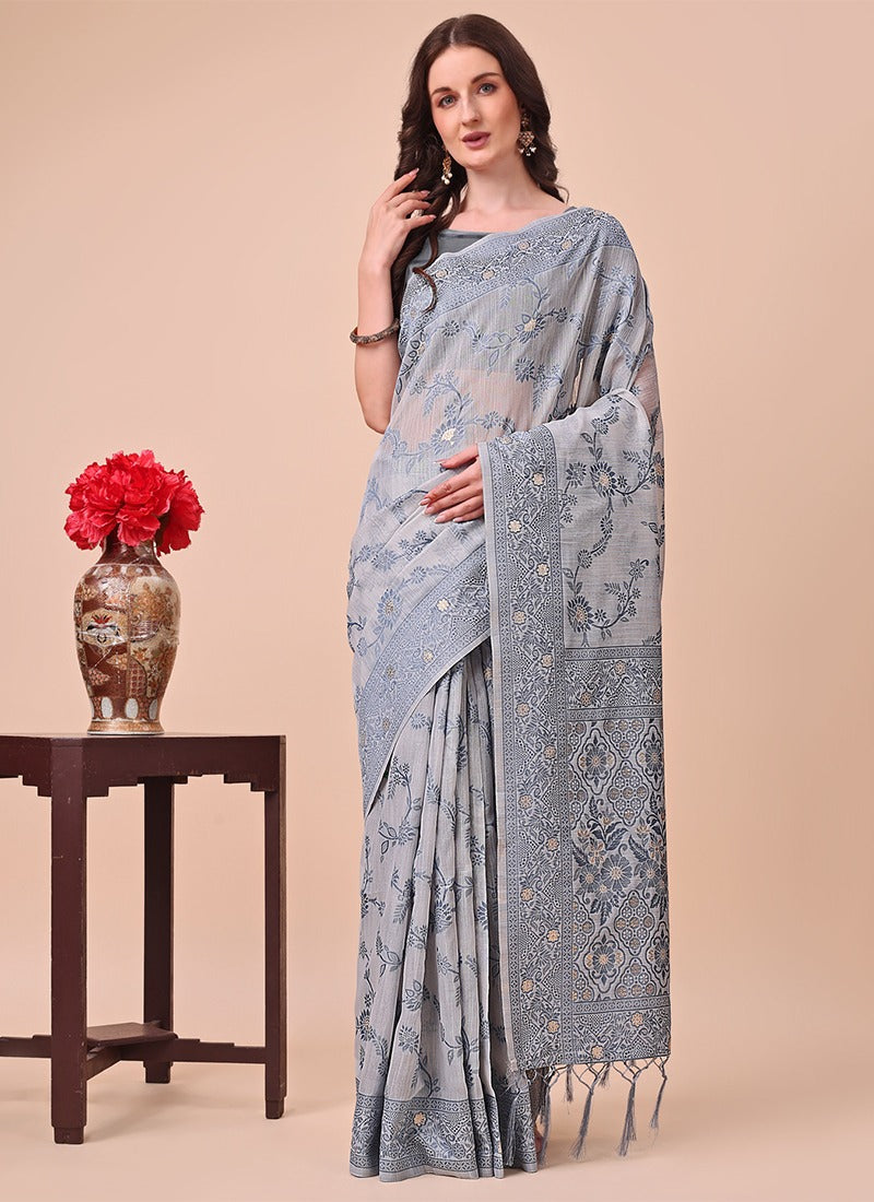 Image of Sea Green Cotton Saree with Floral Weaving & Tassel Pallu from Lehera Fashions