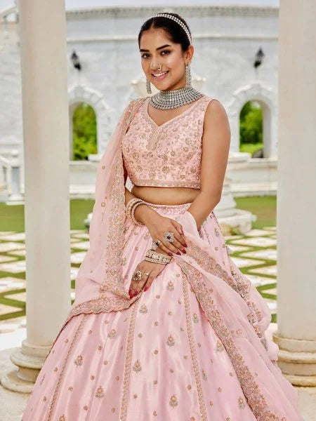 Pink Silk Bridal Lehenga Choli adorned with sequins and intricate thread embroidery